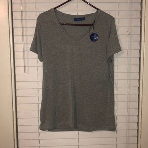 Very cute grey shirt. Never worn !